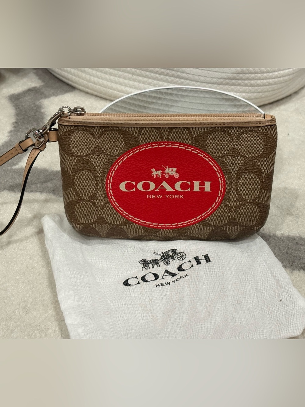 Coach Brown Signature Wristlet with Red Logo Patch